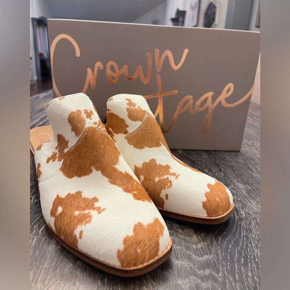size 8, cow print, brand new.